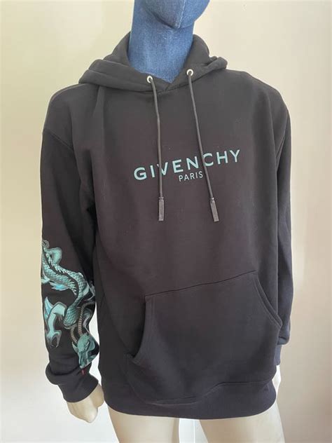 givenchy trui met capuchon donkwrblauw|Blauwe truien voor dames koop je online bij de Bijenkorf.